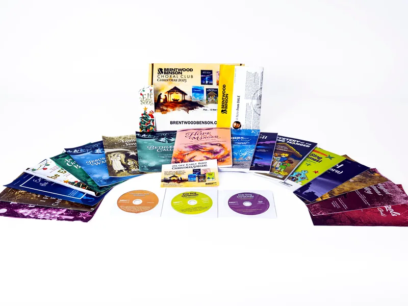 Choral club mailer — box with songbooks and discs fanned on white