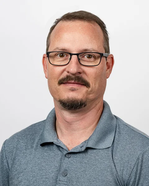 Trent Ganstine, Owner & Operations Partner, on the warehouse floor